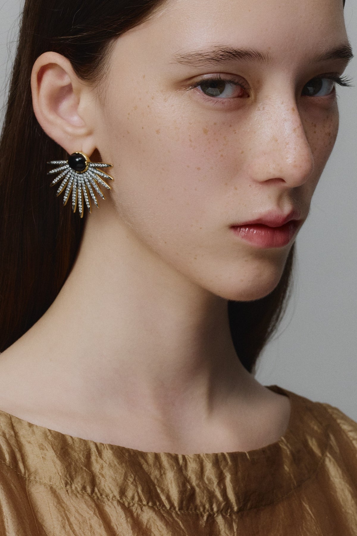 TITAN PENDIENTES ORO